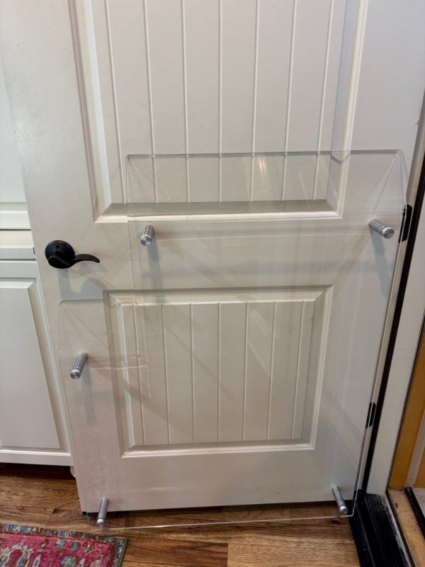 custom-half-door-elevator-baffle-3-75-inch-projection Custom half-door elevator baffle with 3-3/4-inch projection fabricated from 3/8-inch clear acrylic for residential elevator retrofit applications.
